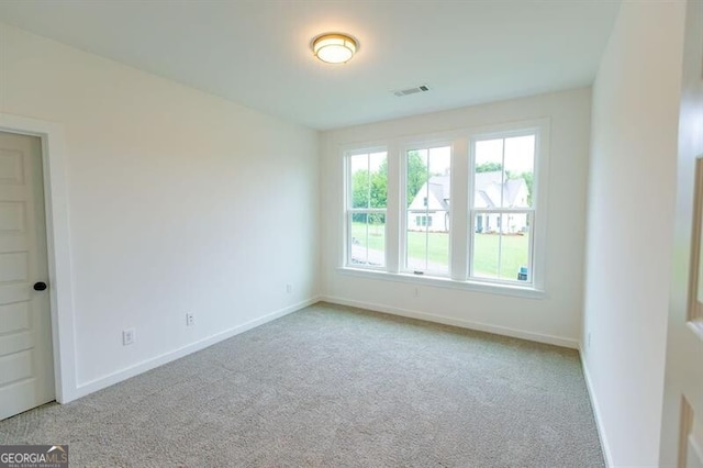 view of carpeted spare room