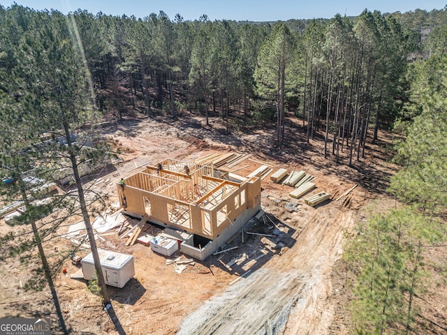 drone / aerial view with a view of trees