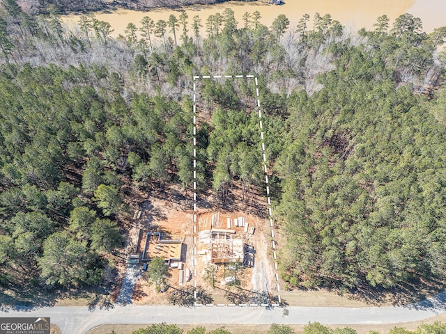 aerial view featuring a forest view