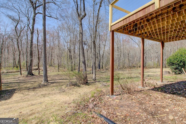 view of yard featuring a view of trees