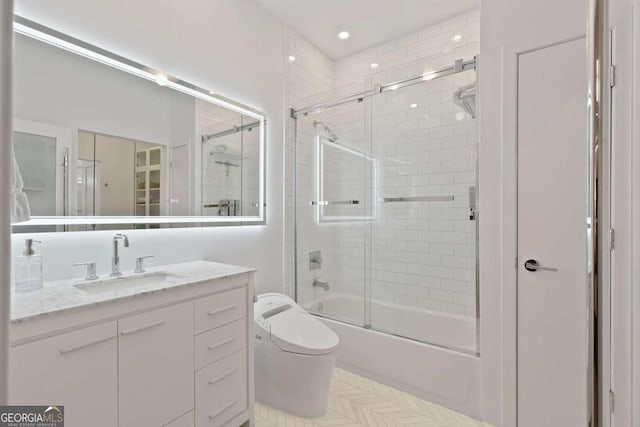 full bath with recessed lighting, combined bath / shower with glass door, toilet, and vanity