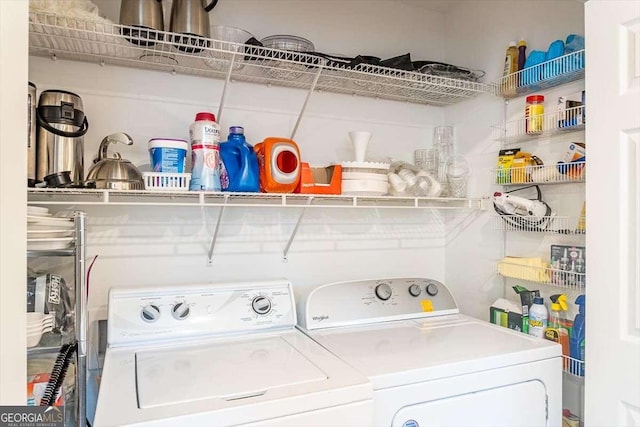 laundry area with washing machine and dryer