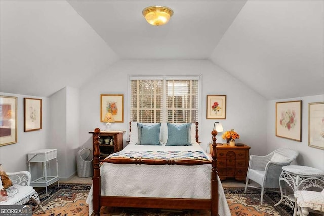 bedroom featuring vaulted ceiling