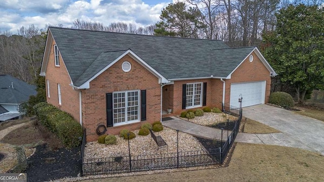 single story home featuring a garage