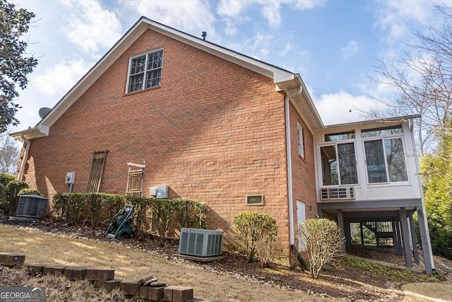 view of home's exterior featuring central air condition unit