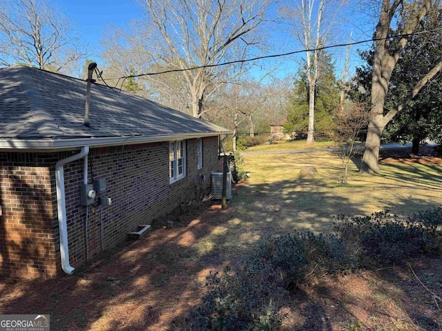 view of side of property featuring cooling unit