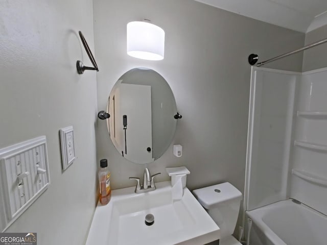 full bathroom featuring  shower combination, toilet, and vanity