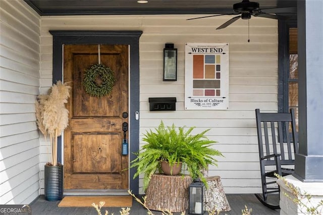 entrance to property with ceiling fan