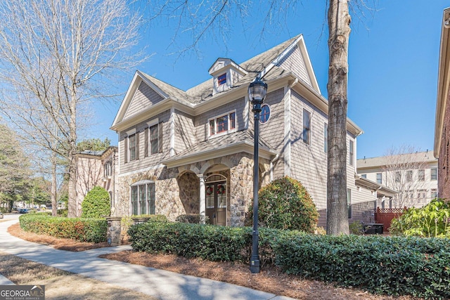 view of front of house with stone siding