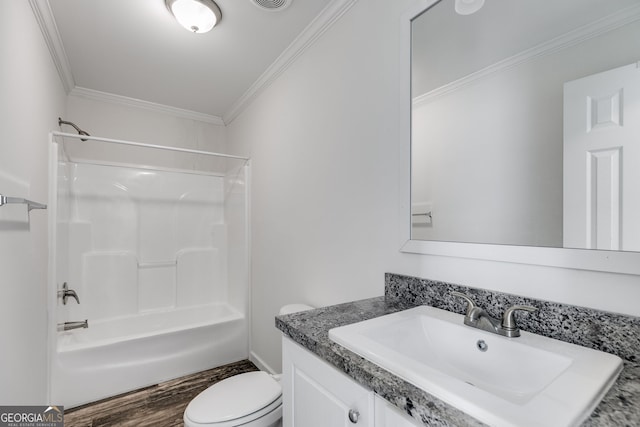 full bathroom with toilet, vanity, crown molding, and shower / bathtub combination