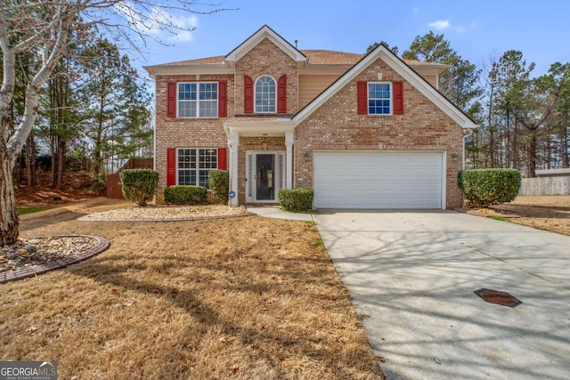 6498 Stonelake Pl SW, Atlanta, GA 30331 - traditional-style home with brick siding, driveway, and an attached garage