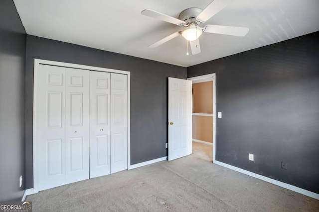 6498 Stonelake Pl SW, Atlanta, GA 30331 - unfurnished bedroom featuring baseboards, carpet floors, a closet, and ceiling fan