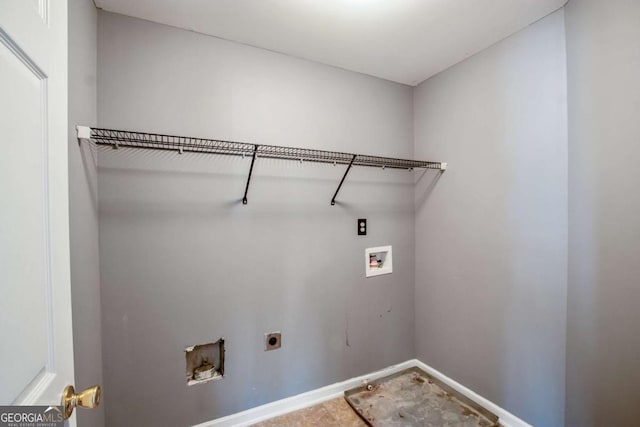 6498 Stonelake Pl SW, Atlanta, GA 30331 - laundry room featuring hookup for a washing machine, hookup for an electric dryer, and baseboards