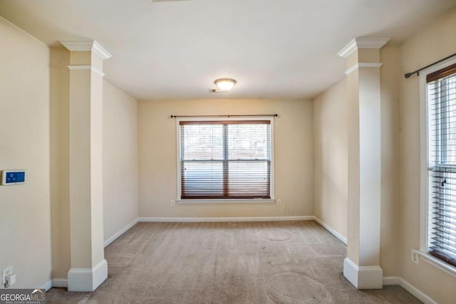 6498 Stonelake Pl SW, Atlanta, GA 30331 - unfurnished room featuring ornate columns, carpet floors, and baseboards