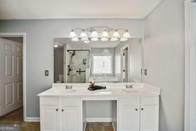6498 Stonelake Pl SW, Atlanta, GA 30331 - bathroom featuring a stall shower, double vanity, and baseboards