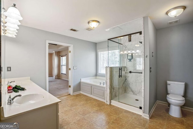 6498 Stonelake Pl SW, Atlanta, GA 30331 - full bath with toilet, a garden tub, a marble finish shower, baseboards, and vanity
