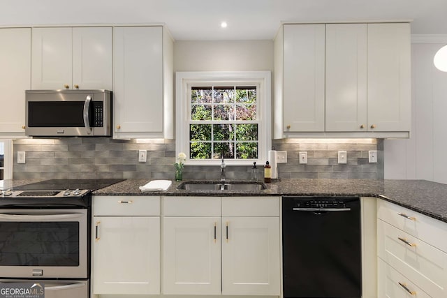 2542 Maclaren, Dunwoody, GA 30360 - kitchen featuring stainless steel appliances, a sink, decorative backsplash, white cabinetry, and recessed lighting
