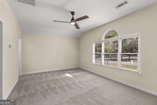 2542 Maclaren, Dunwoody, GA 30360 - spare room with ceiling fan, carpet, vaulted ceiling, and baseboards