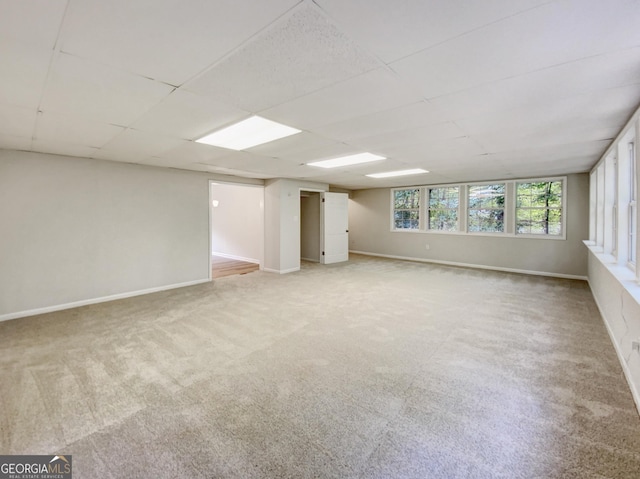 170 Pinehurst Dr, Stockbridge, GA 30281 - unfurnished room featuring light colored carpet and a drop ceiling