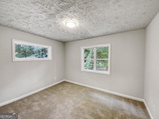 170 Pinehurst Dr, Stockbridge, GA 30281 - carpeted spare room with baseboards