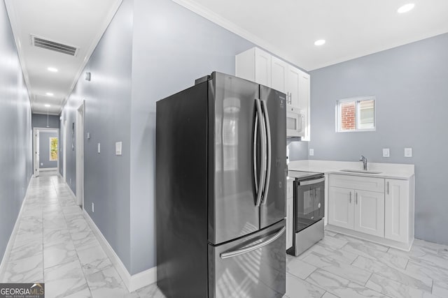 kitchen with stainless steel appliances, visible vents, white cabinets, marble finish floor, and light countertops