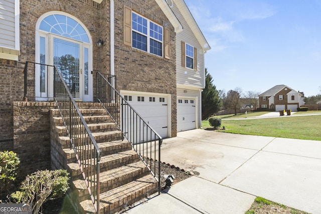 exterior space with a front yard and a garage