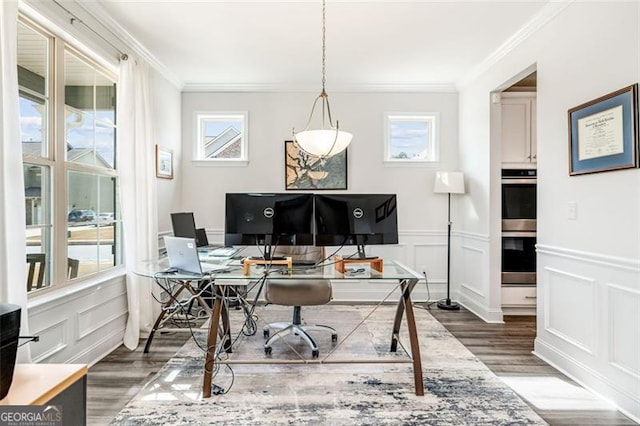 office area with ornamental molding, plenty of natural light, and dark wood-type flooring