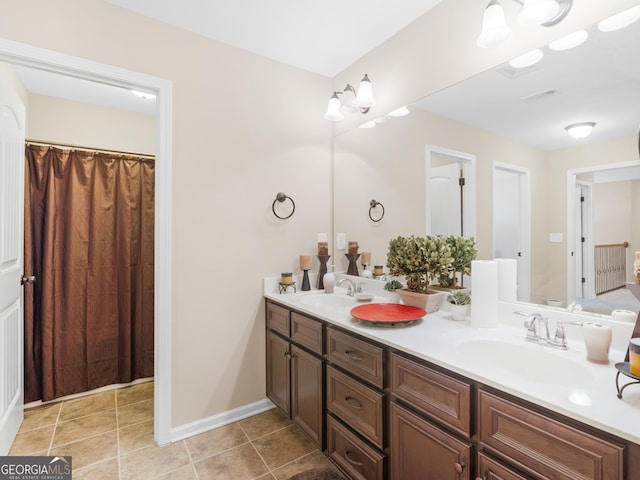 bathroom featuring vanity and tile patterned flooring