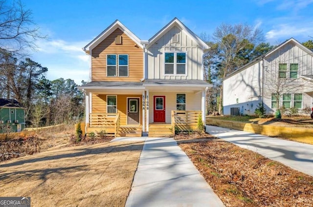 view of front of home with covered porch and cooling unit