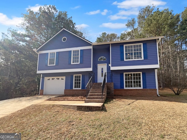 split foyer home featuring a garage