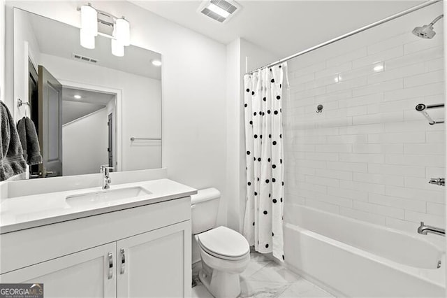 full bathroom featuring shower / bath combo with shower curtain, vanity, and toilet