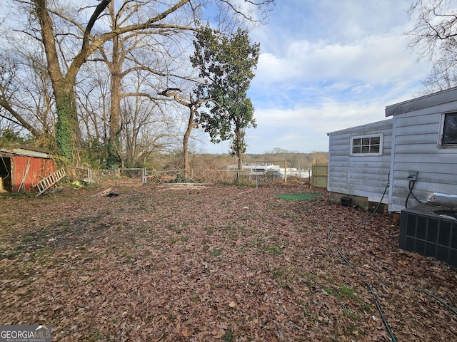 view of yard featuring central AC unit