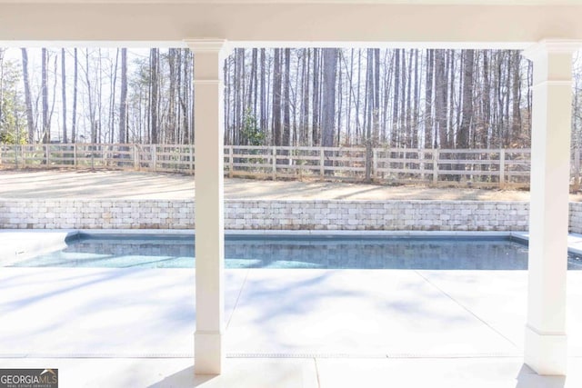 view of swimming pool with a fenced backyard and a fenced in pool