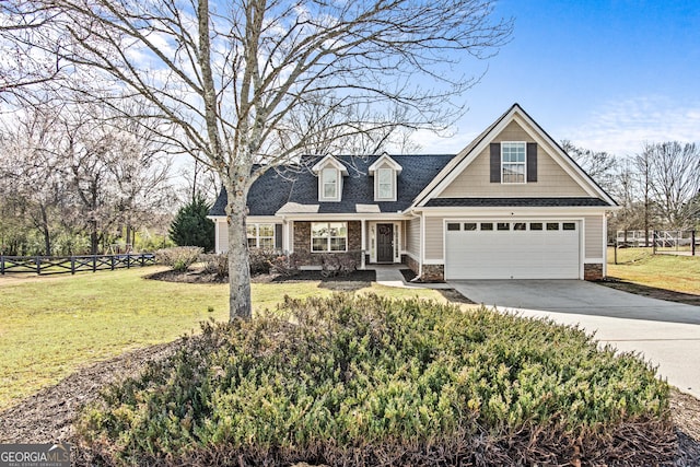 view of front facade featuring driveway, a garage, stone siding, fence, and a front yard