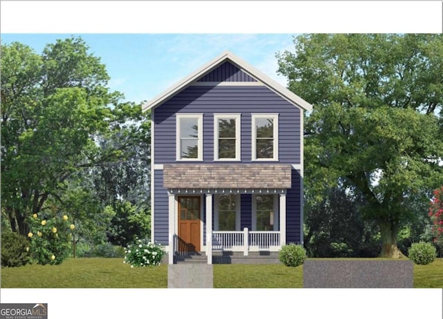 view of front of property with covered porch and a front yard