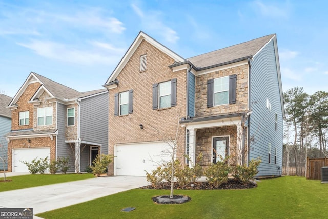 view of front of house featuring a garage and a front lawn