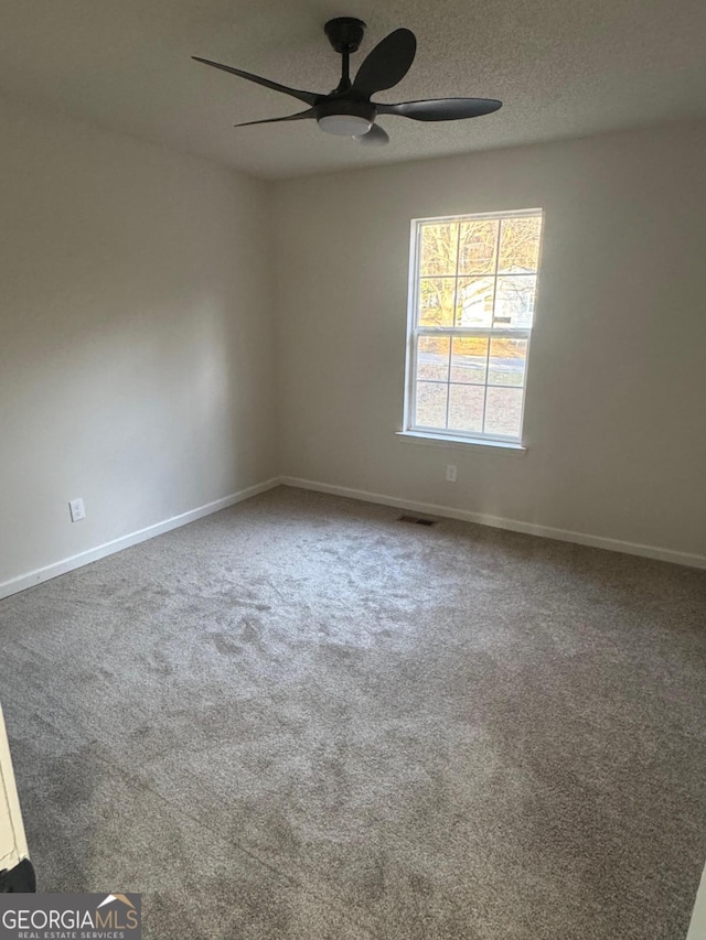 1753 Lee St, Decatur, GA 30035 - carpeted spare room featuring a textured ceiling and ceiling fan