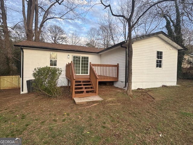 1753 Lee St, Decatur, GA 30035 - rear view of property with a deck and a yard