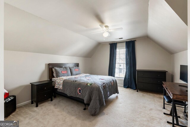 bedroom with lofted ceiling, visible vents, ceiling fan, and light carpet