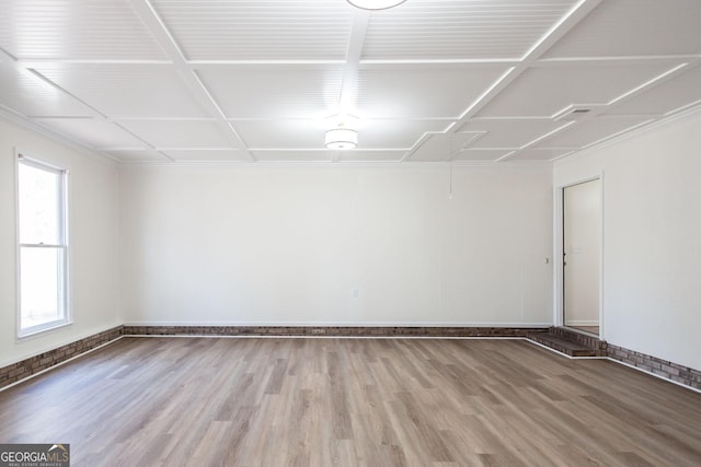 702 Hillmont Dr, Waycross, GA 31503 - spare room with wood finished floors and baseboards