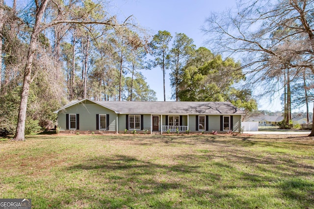 ranch-style house featuring a front lawn and a porch