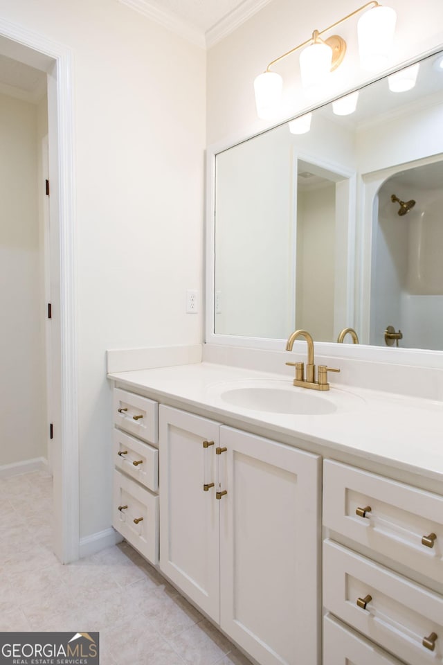 702 Hillmont Dr, Waycross, GA 31503 - bathroom with crown molding, vanity, and tile patterned flooring