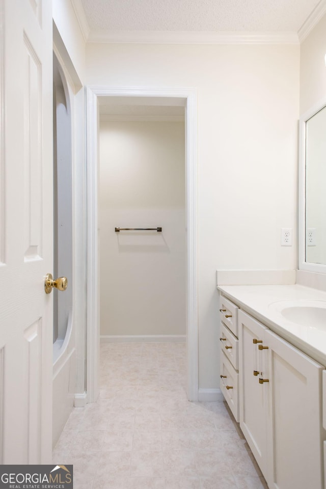 702 Hillmont Dr, Waycross, GA 31503 - full bathroom featuring vanity and crown molding