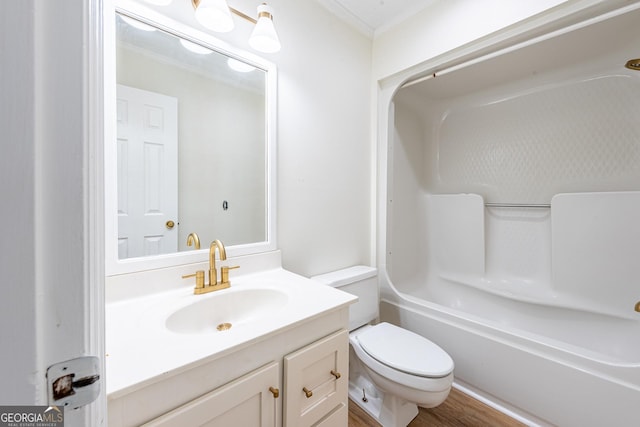 702 Hillmont Dr, Waycross, GA 31503 - full bathroom featuring vanity, ornamental molding, and wood finished floors