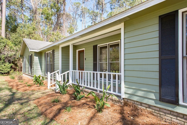 702 Hillmont Dr, Waycross, GA 31503 - view of side of home with a porch