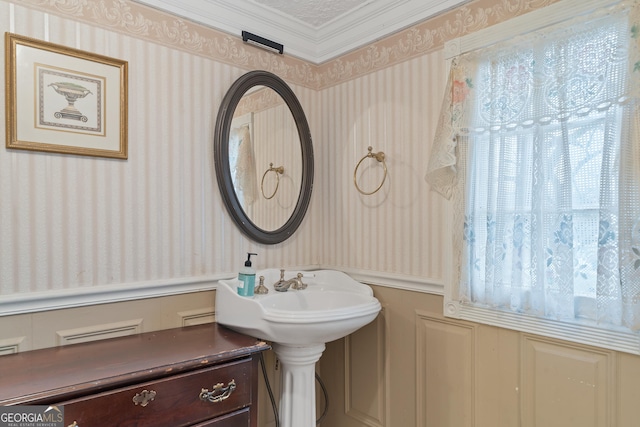 bathroom with crown molding