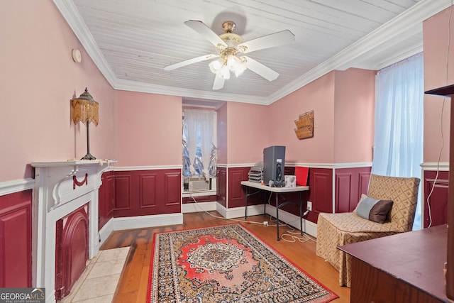 office area featuring ceiling fan, crown molding, plenty of natural light, and light hardwood / wood-style flooring