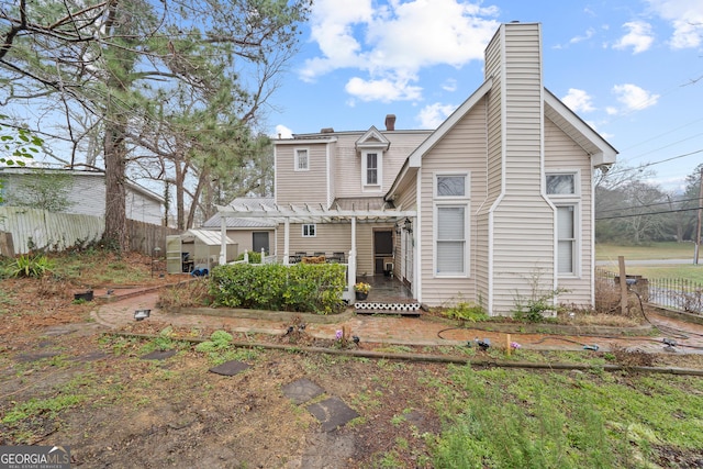 view of front of house with a pergola and a porch