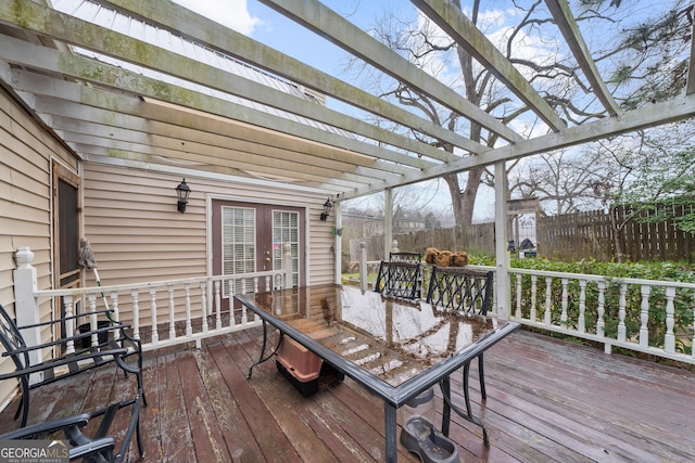 wooden deck featuring a pergola