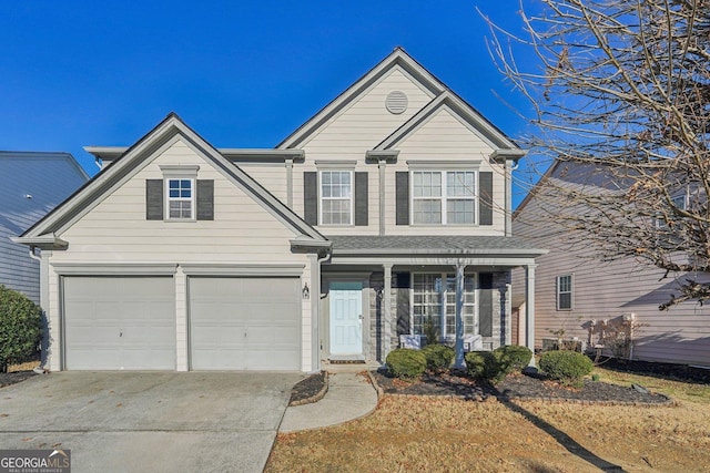 front of property with covered porch and a garage